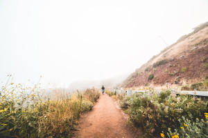 young-woman-hiking-the-mountain-trail-in-foggy-weather-picjumbo-com
